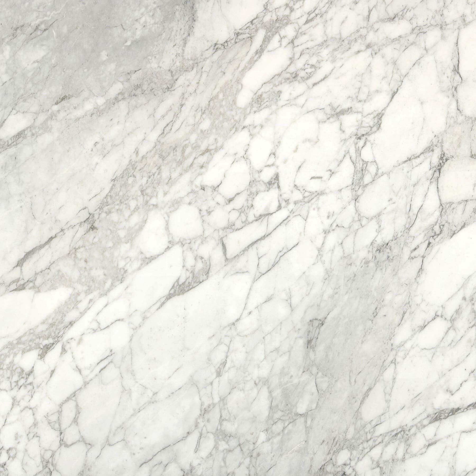 White stone sample with soft grey veining