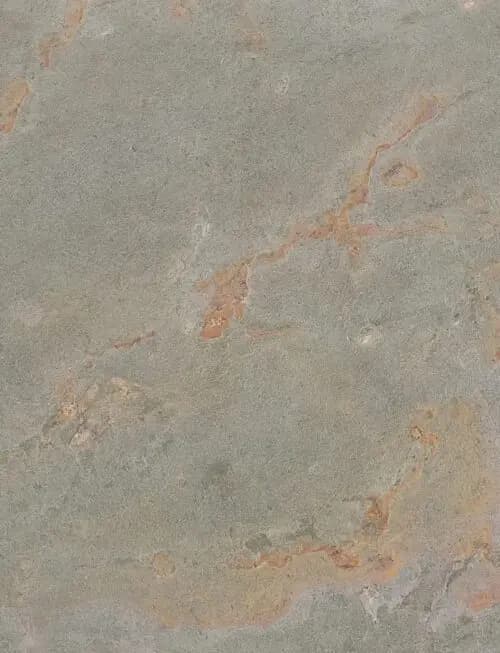 Jade sample: green-grey with rust patches