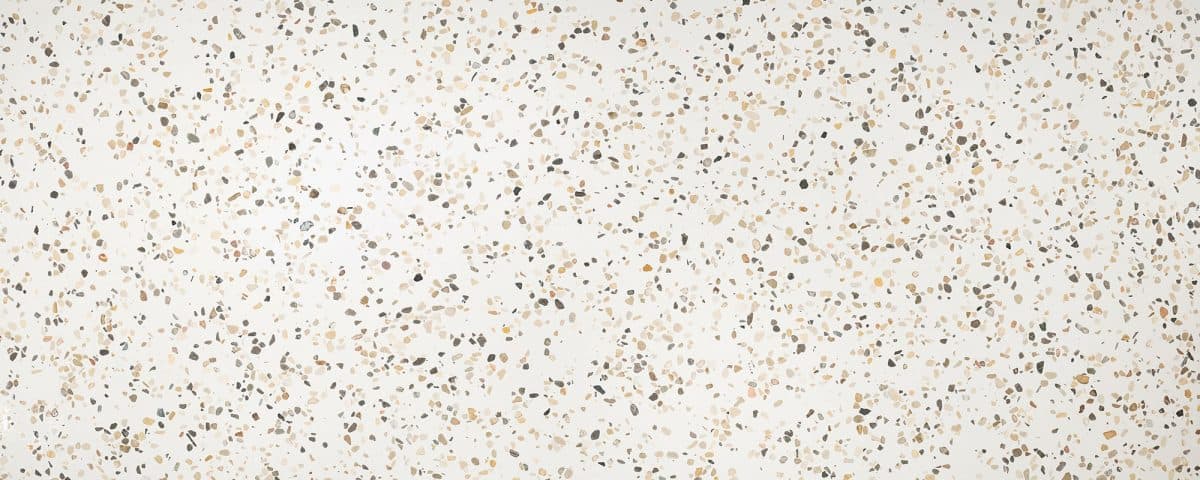 Classic Estremoz slab: white terrazzo look with brown flecks