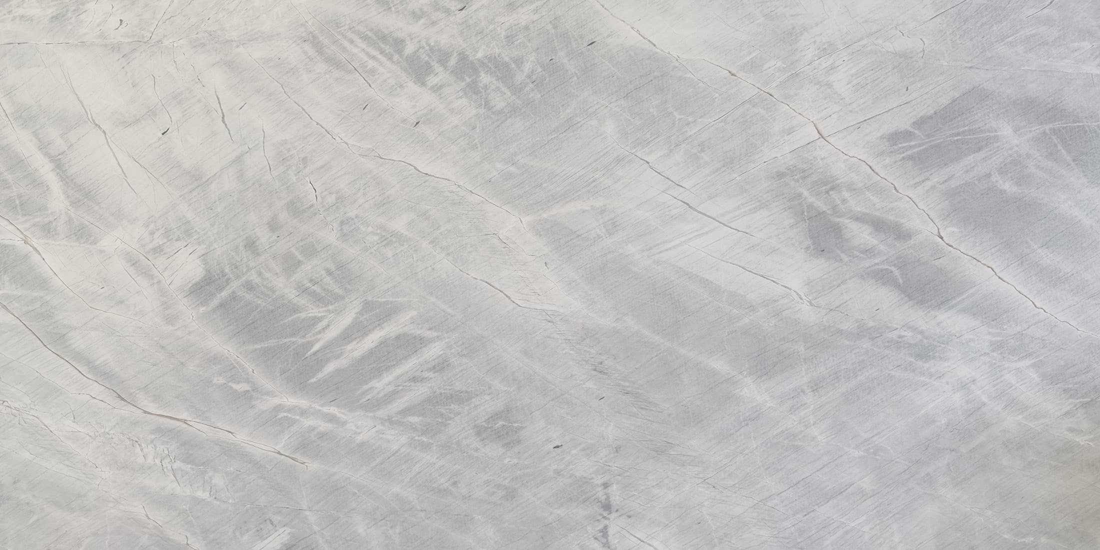 Korra Grey slab: soft grey with criss-cross veining